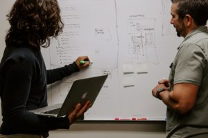 People discussing a plan using data.