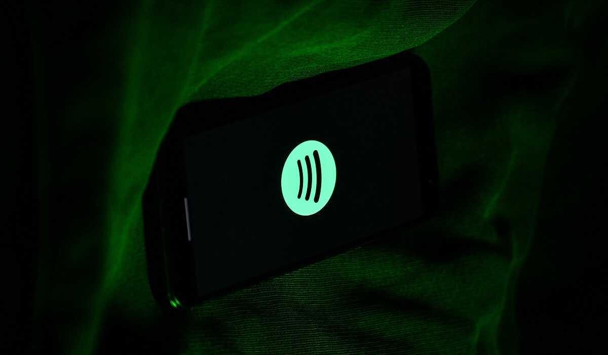 A picture of a smartphone using Spotify.