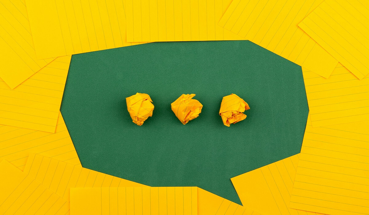 A group of papers forming a speech bubble.