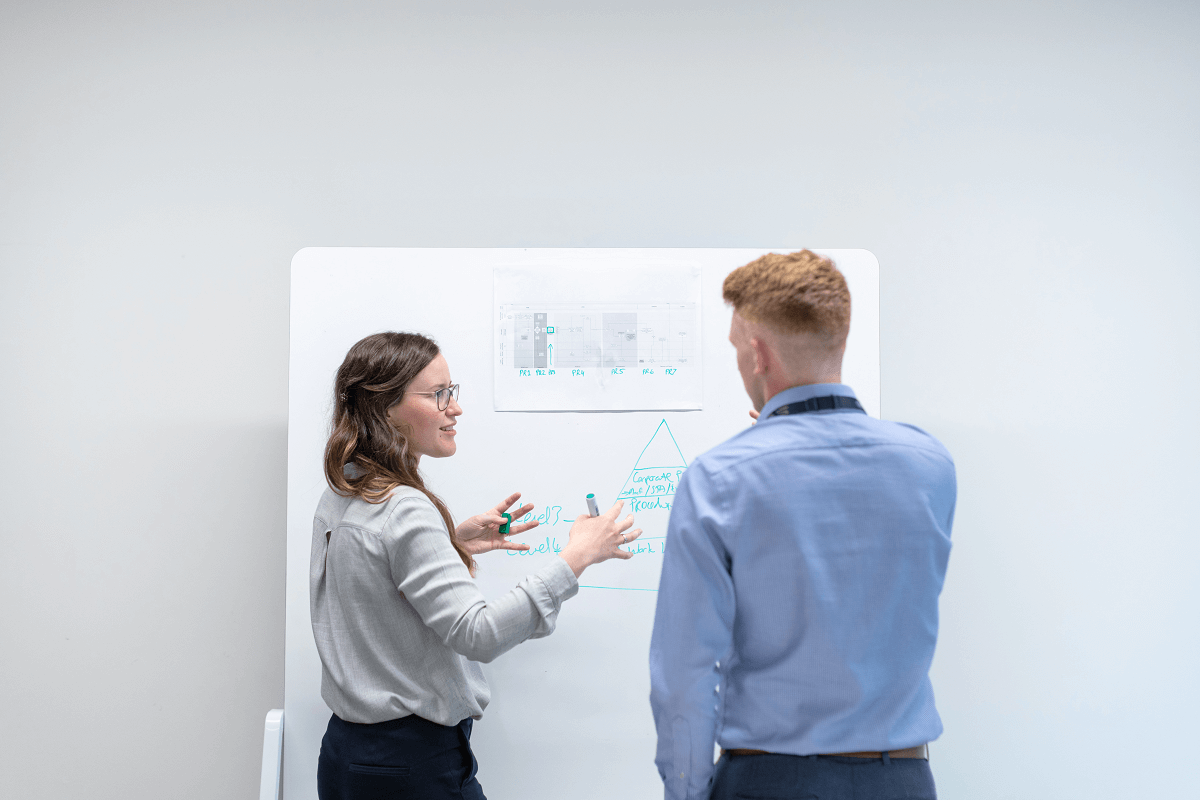 People evaluating a chart.